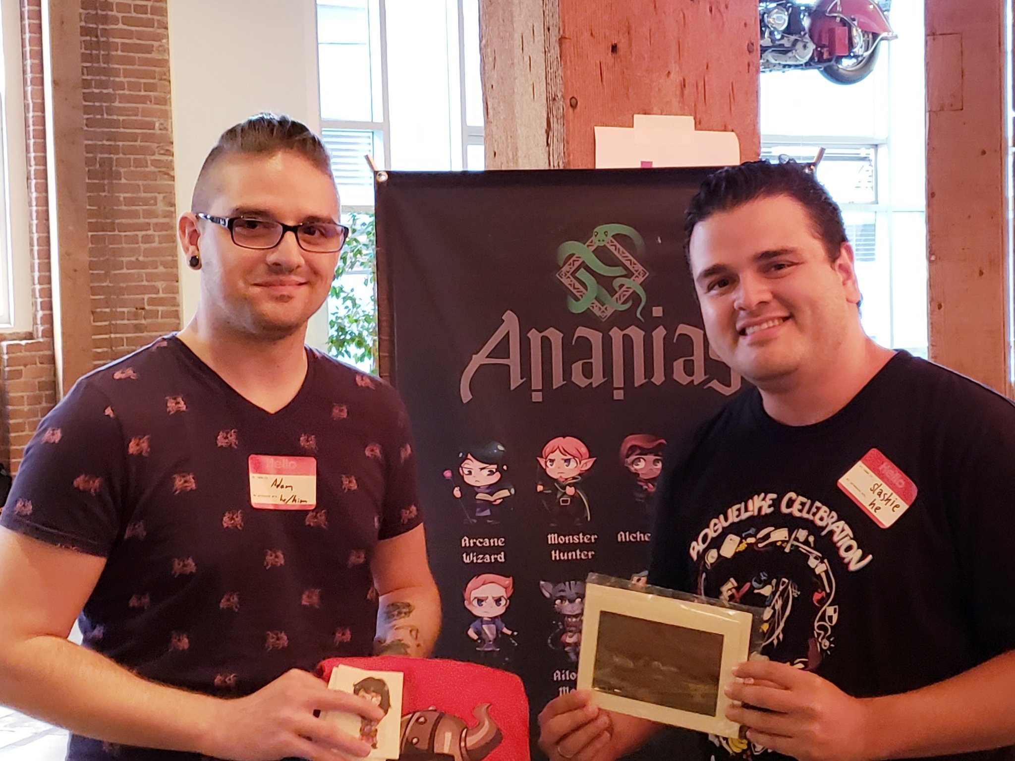 Adam Boyd receiving his prizes at roguelikecel